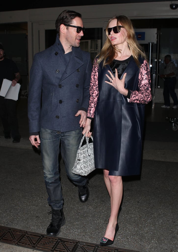 Kate Bosworth and her husband, Michael Polish, walked through LAX airport in LA on Monday.