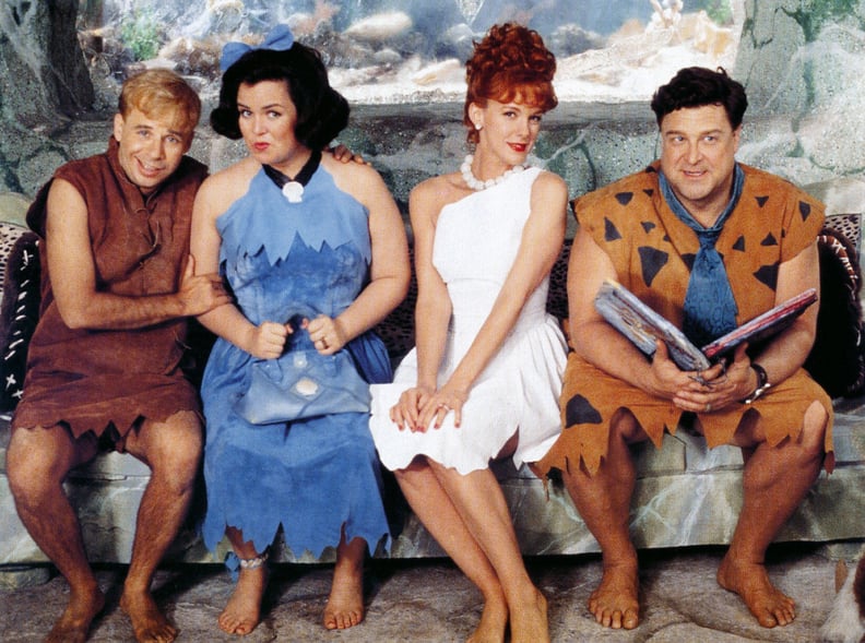 THE FLINTSTONES, from left: Rick Moranis, Rosie O'Donnell, Elizabeth Perkins, John Goodman, 1994,  Universal/courtesy Everett collection