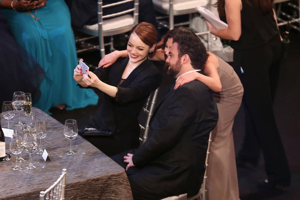 Emma Stone snapped a selfie with her brother, Spencer, and a friend during the show.