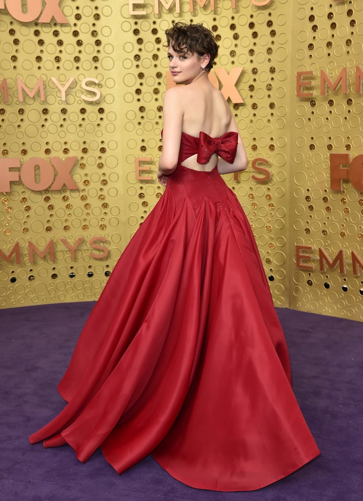 Wearing a gorgeous red gown Zac Posen ball gown that flared at the waist at the 2019 Emmys.