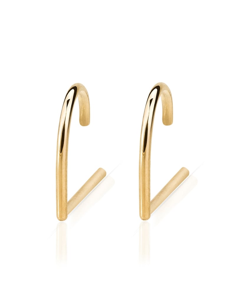 "Studs? Hoops? I can never decided, so in my opinion, Smith + Mara's 14k Gold Suspender Earring ($150) is the best of both worlds. They're studs that look like (quirky) hoops, since the top part sits on your inner ear. I guess that make it a . . . stoop?" — SS