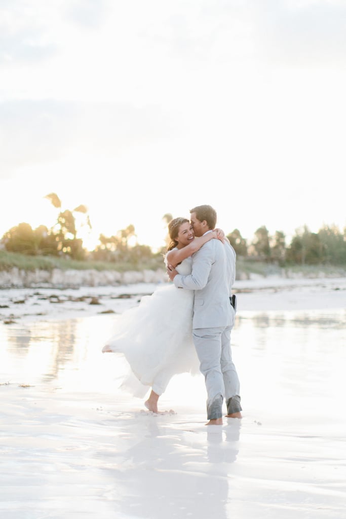 A Carefree Bride That Doesn't Even Mind Getting the Hem of Her Dress Sandy