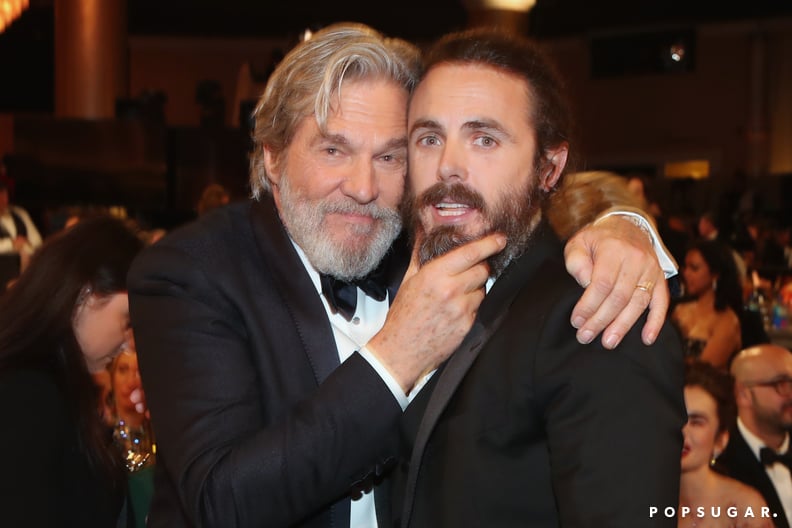 Jeff Bridges playfully grabbed Casey Affleck's beard.