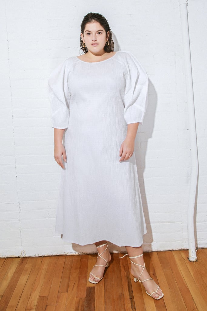 The Mara Hoffman Cecilia Dress ($350) features a Zoom-appropriate boat neckline and three-quarter-length sleeves. The textured cotton fabric will help contrast it against a plain white wall, but since the design is also white, you could try situating yourself in front of a colorful painting or plant.