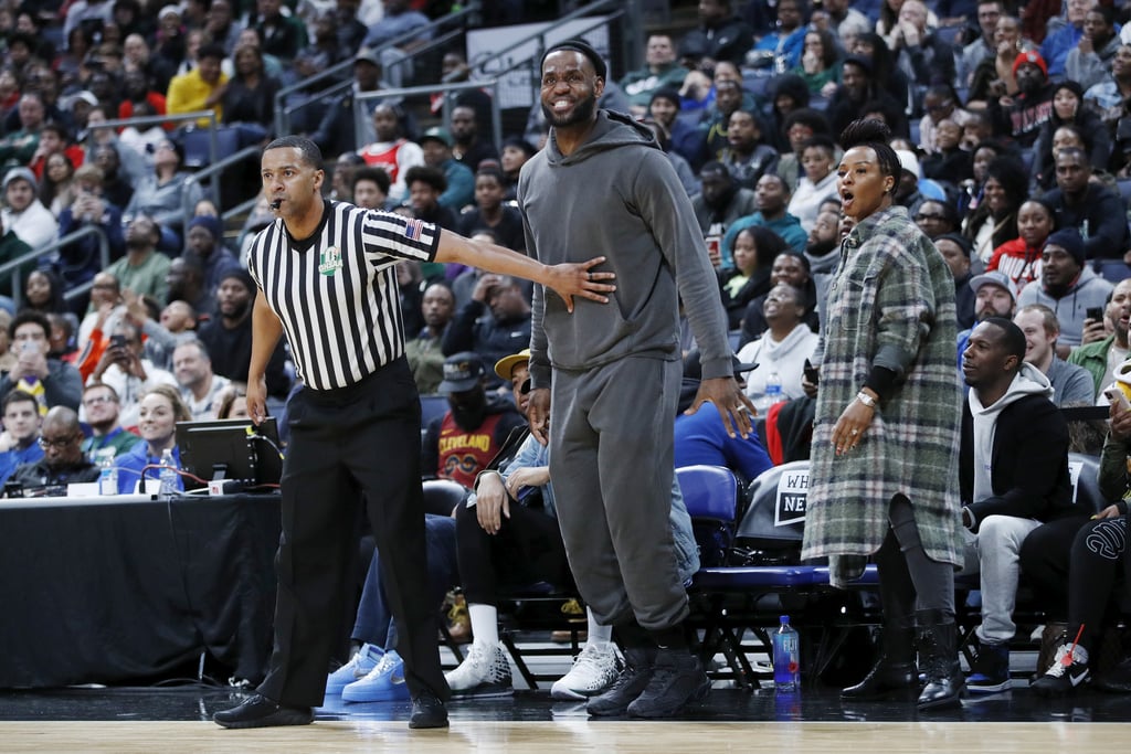 LeBron James had a full-circle moment over the weekend. The proud father and Los Angeles Lakers star witnessed his son beat the high school team he played for 17 years ago. On Saturday, his 15-year-old son, LeBron James Jr. (aka Bronny), and the talented Sierra Canyon High School basketball team bested LeBron's alma mater, St. Vincent-St. Mary High School, at Nationwide Arena in Columbus, OH, and LeBron was overwhelmed with emotions. Being a proud sports parent is one thing, but when you're LeBron James and your son is playing your alma mater, it's a whole different experience.
He and wife Savannah were surrounded by their closest family and friends, and despite it being LeBron's day off from professional basketball, he beamed with pride as they cheered from the sidelines. Following the game, LeBron took to Instagram to share a clip and some photos of the special moment. "Last night was such a surreal feeling for me!" he wrote. "Watching my son play in our home state vs my Alma mater St. VM who's still being coached by my mentor, father figure, guy who coached and helped guide me throughout my childhood both on and off the floor Coach Dru Joyce II. . . . For @Bronny to play the best game of his young high school career so far, make the biggest play of the game and to walk away winning the MVP in his/our home state and his family and friends was a story book moment."
He added, "So so so eerie but I know it was SPECIAL and meant the world to me to be there in attendance! Can't even lie I was nervous as hell for him but damn he was poised and controlled. WHAT AN UNBELIEVABLE NIGHT it was! Thank you man above and 🏀!! #JamesGang👑 #WeareallkidsfromAKRON🙏🏾" LeBron also posted a photo of himself from after a win in a high school game 17 years earlier, sharing it alongside a picture of Bronny from after Saturday's game. In the photos, LeBron and Bronny are holding trophies and standing with the same man, who put both games together. "This is craziness/surreal!!" he wrote. 
Sure, Bronny beat his dad's high school team 59-56, but LeBron couldn't have been more proud. His son had a career-high 15 points, made the game-winning play, and was named the MVP of the game. Check out photos from the game ahead, and prepare to let out an audible "awww" at the special moment.

    Related:

            
            
                                    
                            

            Parents, Going to Every One of Your Kids&apos; Games Matters More Than You Know