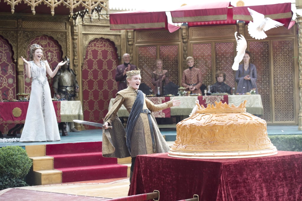 A giant pie filled with pigeons greets the newlyweds.