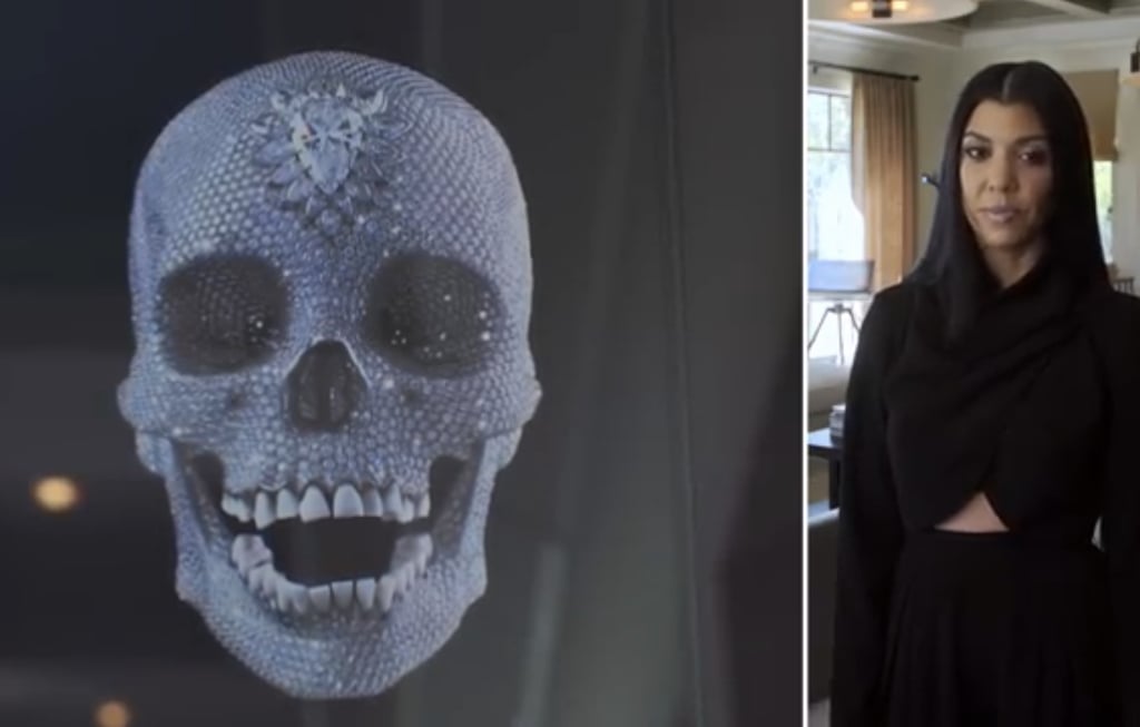 A Damien Hirst diamond skull, which was a gift from Kourtney's ex Scott Disick, sits in her living room.