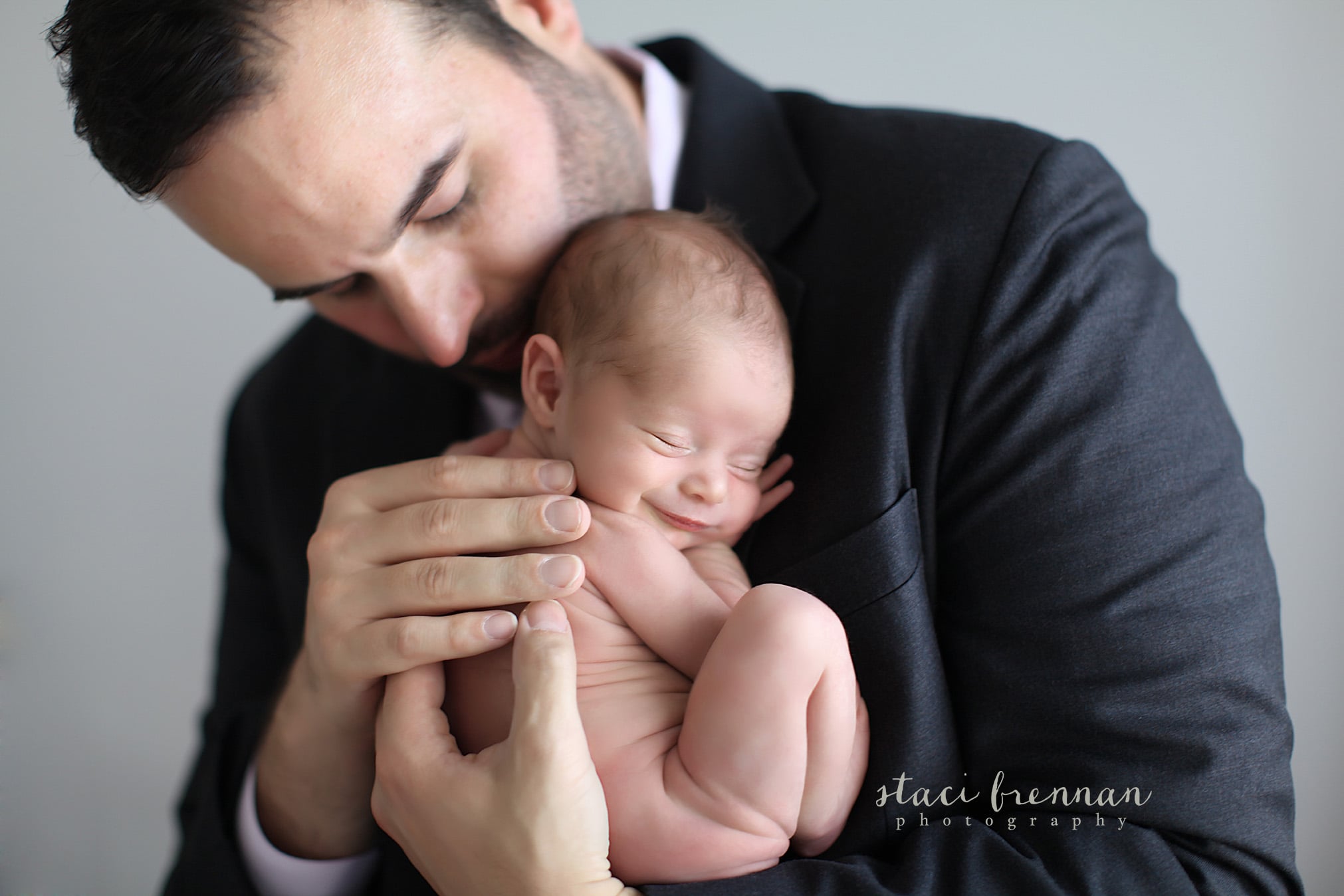 Man Carrying Baby