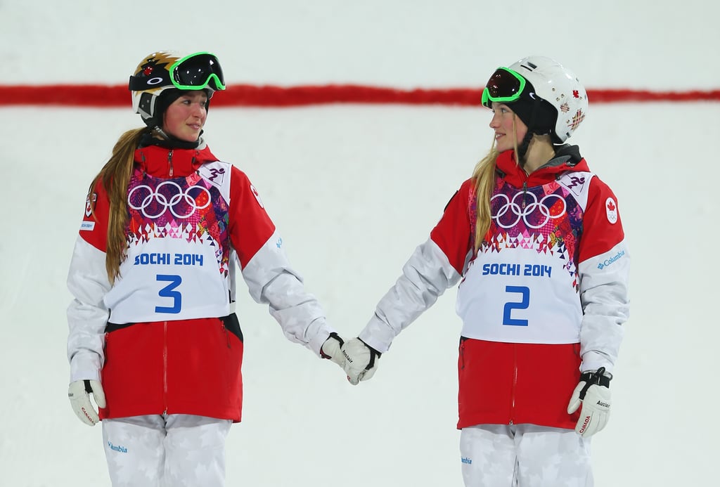 Canadian sisters Chloe and Justine Dufour-Lapointe held hands after earning the gold and silver medals in the freestyle skiing women's moguls finals.