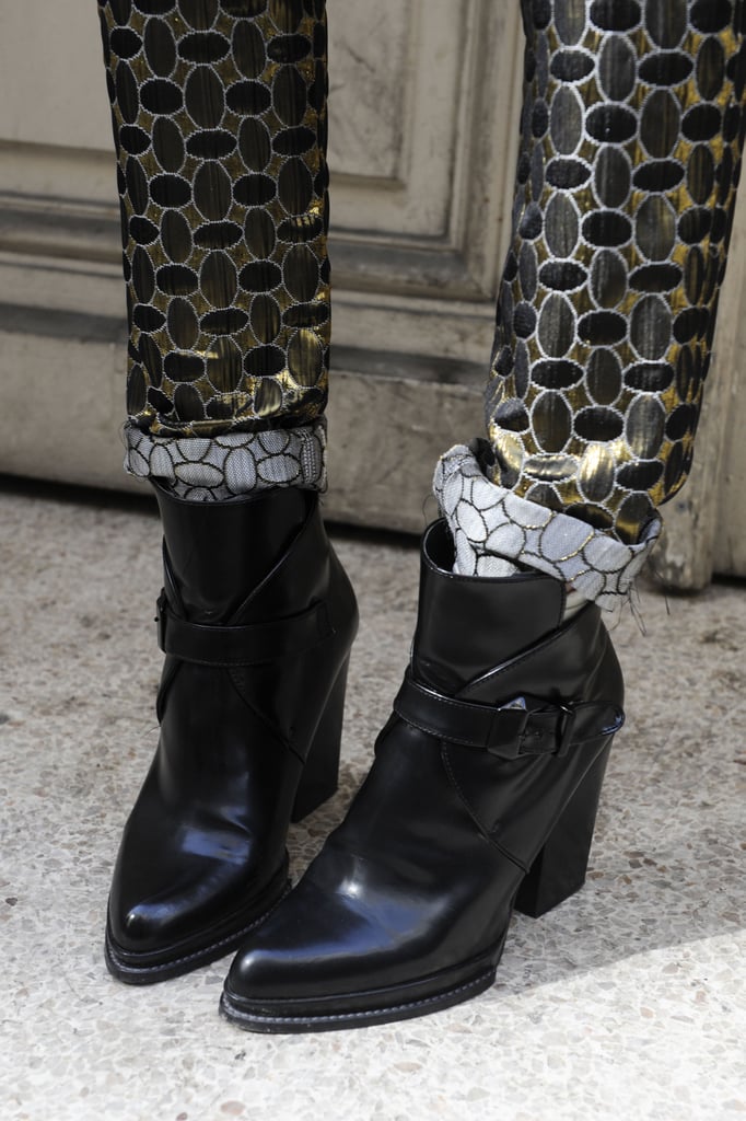 An edgy play on this season's favorite Chelsea boot silhouette looked especially cool against brocade bottoms.
An edgy play on this season's favorite Chelsea boot silhouette looked especially cool against brocade bottoms.