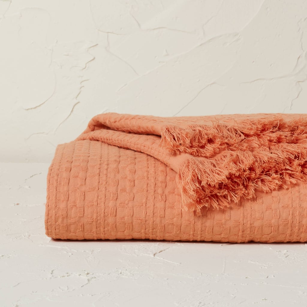 A Waffle Blanket: Opalhouse designed with Jungalow Oversized Waffle Weave Bed Throw