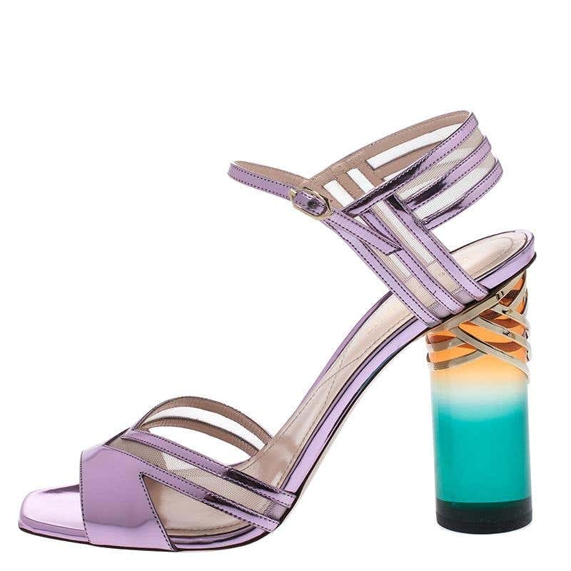 Selena Gomez s Purple Lucite Heels With Sparkly Green Outfit