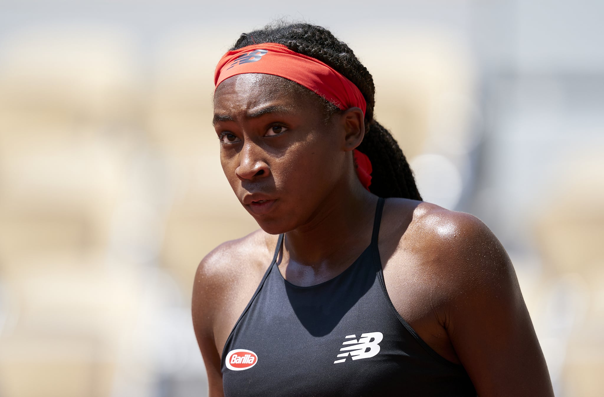 PARIS, FRANCE - JUNE 09: Coco Gauff of The United States of America looks on in her Quarter Final match against Barbora Krejcikova of Czech Republic during day eleven of the 2021 French Open at Roland Garros on June 09, 2021 in Paris, France. (Photo by Tnani Badreddine/Quality Sport Images/Getty Images)