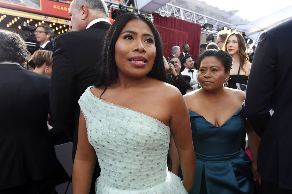 This year's Oscars red carpet is like a family reunion, with celebrities showing up with parents and siblings left and right. One of the cutest pairs of the night? Twenty-five-year-old Roma star Yalitza Aparicio walked her very first Oscars red carpet alongside her mom, Margarita. The best actress nominee looked gorgeous in a teal chiffon tulle gown by Rodarte, complete with a sparkling bodice, and her mother looked equally incredible in a blue gown as the two walked hand-in-hand down the red carpet. Aparicio is one of two Mexican women ever nominated for best actress at the Oscars and the only indigenous woman to ever be up for the award, so it's particularly special to know the young Roma actress had her mom by her side for such a special night.

    Related:

            
            
                                    
                            

            These Stars Are Shining Tonight — Take a Peek at the Best Beauty Looks From the Oscars