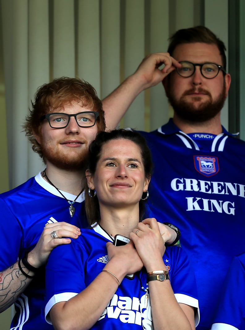 IPSWICH, ENGLAND - APRIL 21:  Musician Ed Sheeran and fiance Cherry Seaborn look on during the Sky Bet Championship match between Ipswich Town and Aston Villa at Portman Road on April 21, 2018 in Ipswich, England. (Photo by Stephen Pond/Getty Images)