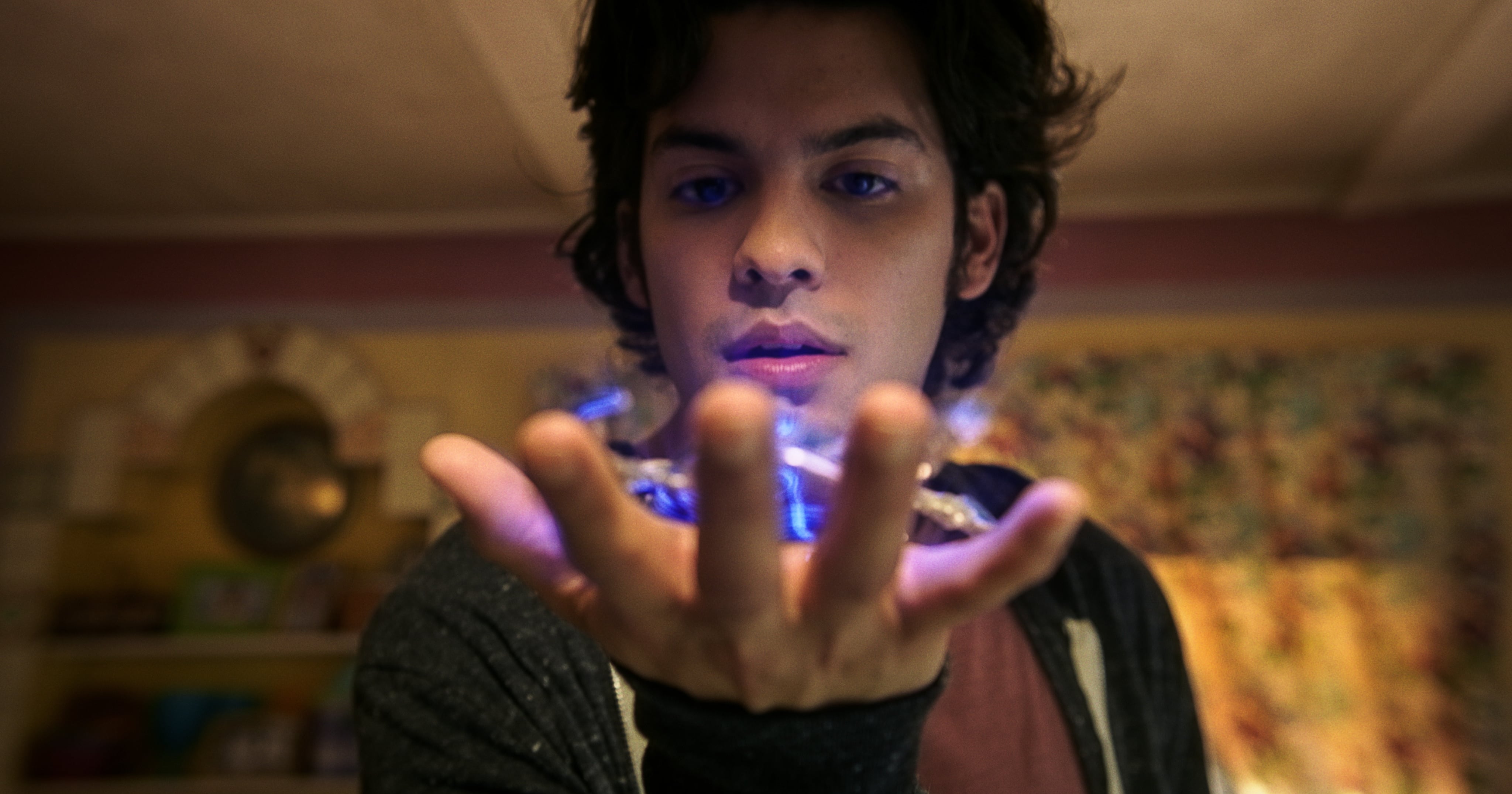 Xolo Maridueña Channels the Power of the Scarab in the Final “Blue Beetle” Trailer