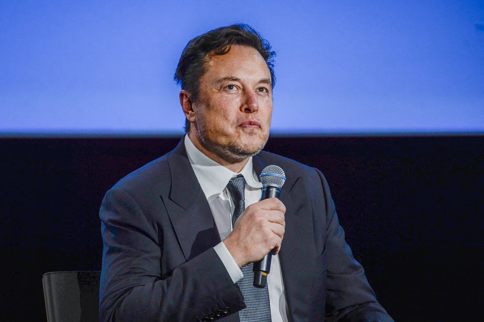 Tesla CEO Elon Musk looks up as he addresses guests at the Offshore Northern Seas 2022 (ONS) meeting in Stavanger, Norway on August 29, 2022. - The meeting, held in Stavanger from August 29 to September 1, 2022, presents the latest developments in Norway and internationally related to the energy, oil and gas sector. - Norway OUT (Photo by Carina Johansen / NTB / AFP) / Norway OUT (Photo by CARINA JOHANSEN/NTB/AFP via Getty Images)