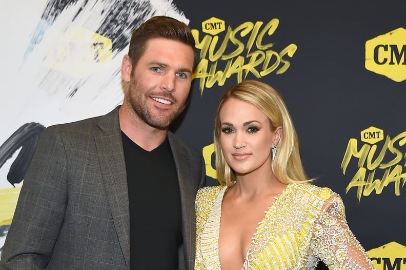 NASHVILLE, TN - JUNE 06:  Mike Fisher (L) and Carrie Underwood attend the 2018 CMT Music Awards at Bridgestone Arena on June 6, 2018 in Nashville, Tennessee.  (Photo by Rick Diamond/Getty Images for CMT)