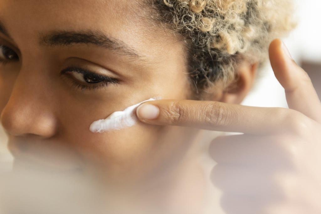 "Avoid mixing retinol with acne treatments containing salicylic acid as they cause drying and redness as well," said Dr. Engelman. "Avoid mixing benzoyl peroxide with retinol as it has been shown that the two ingredients together have a tendency to deactivate each other." But there is an exception to this rule: if the products have been specifically formulated to be used simultaneously, then it's OK.  
Starting retinol doesn't mean you have to give up AHAs and BHAs forever — it's just until your skin fully adjusts. "Over time, the skin acclimated to vitamin A derivatives like retinol and retinoids and gentle exfoliants containing AHA/BHAs can be slowly incorporated into your routine."
The Rule #4: Don't Mix Vitamin C With Retinol
If you're using retinol to fade acne scars or hyperpigmentation you may be thinking retinol and vitamin c are the perfect skin brightening mix, but that's not the case. "Retinol users should avoid vitamin C products that sting when applied to the skin," said Rouleau. "Most vitamin C products out on the market use the acid forms of the vitamin, like Ascorbic Acid." That doesn't mean you need to choose one over the other — you just need to be strategic in application. 
Retinol should always be used at night, follow by a sunscreen in the morning. Vitamin C, on the other hand, should be used in the morning to protect against free radical damage and provide your skin with antioxidants. You never want to layer them together in the same routine. 
The Rule #5: Don't Start Retinol Too Early
Yes, retinol is an amazing product, but unless you're directed to by a professional, you don't want to start using it too early. "Some patients start using retinoids earlier to combat acne issues," said Dr. Engelman. "Others I advise to start later to treat signs of aging. Timing depends on what skin issue we are targeting." 
The Rule #6: Be Careful When It Comes to Prescription Retinol
You may think that prescription products are always better, but that may not be the case for your skin. The main difference between over-the-counter (OTC) and prescription retinol is the first is a weaker form of vitamin A and therefore more forgiving on the skin. "Retinoic acid (what you find in prescription products) is the most active form of Vitamin A," said Dr. Engelman. "Biochemically, retinoid and retinol, have the same effects — it may just take longer to see results with retinols, since they are weaker."
But Rouleau only recommends using prescription retinoids if you're over 35 and your skin can handle it. "Most people have a certain degree of skin sensitivity, which is why I suggest using a non-prescription retinol first," said Rouleau. The exceptions to this are if you have certain skin concerns, they may require a more heavy-duty approach, like someone with indented facial scarring from acne or melasma.
When in doubt consult with your dermatologist to find out what's best for your skin.
For more beauty tips, news, and interviews, please click here.