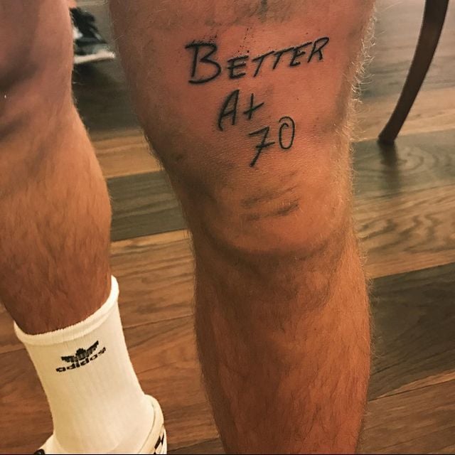 Justin Bieber’s “Better at 70” Knee Tattoo