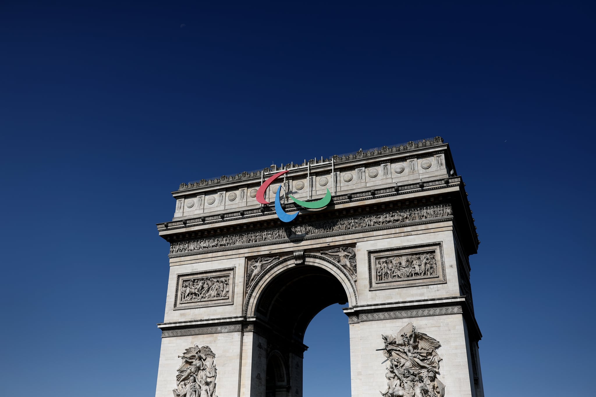PARIS, FRANCE - AUGUST 26:  The Paralympic logo is seen on the Arc de Triomphe Previews around Paris ahead of the Paralympic Games on August 26, 2024 in Paris, France. (Photo by Naomi Baker/Getty Images)