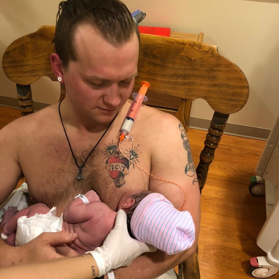 Dad Breastfeeds Newborn Daughter