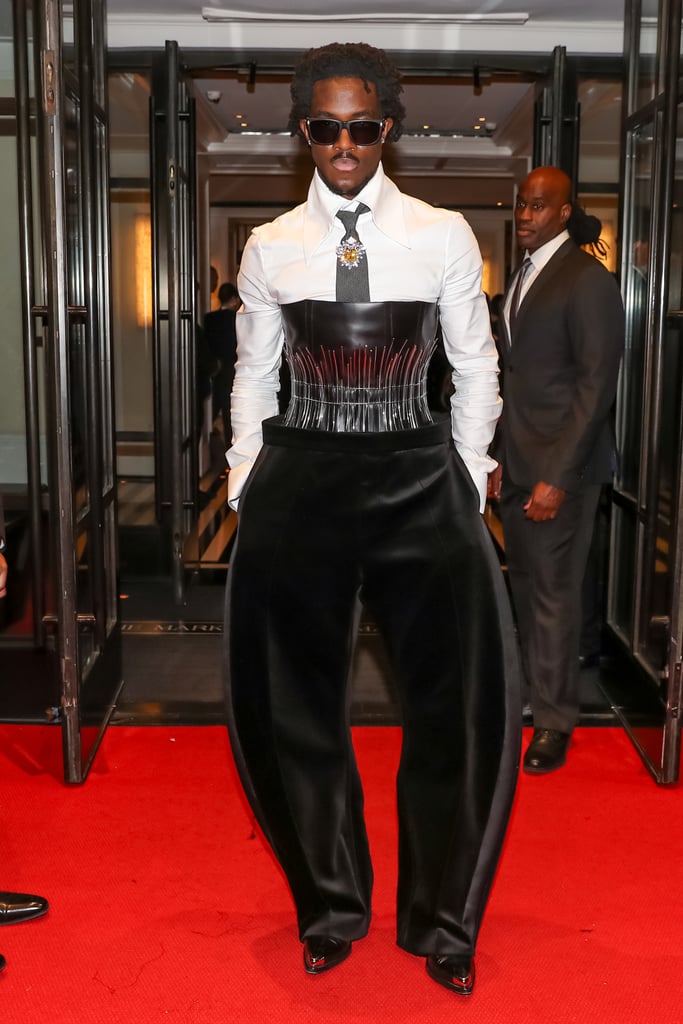 Wisdom Kaye leaving the Mark Hotel wearing custom Public School