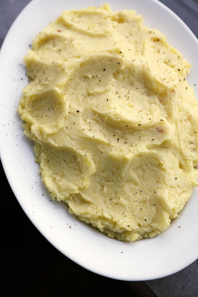 Overworking the potatoes in a food processor or blender.