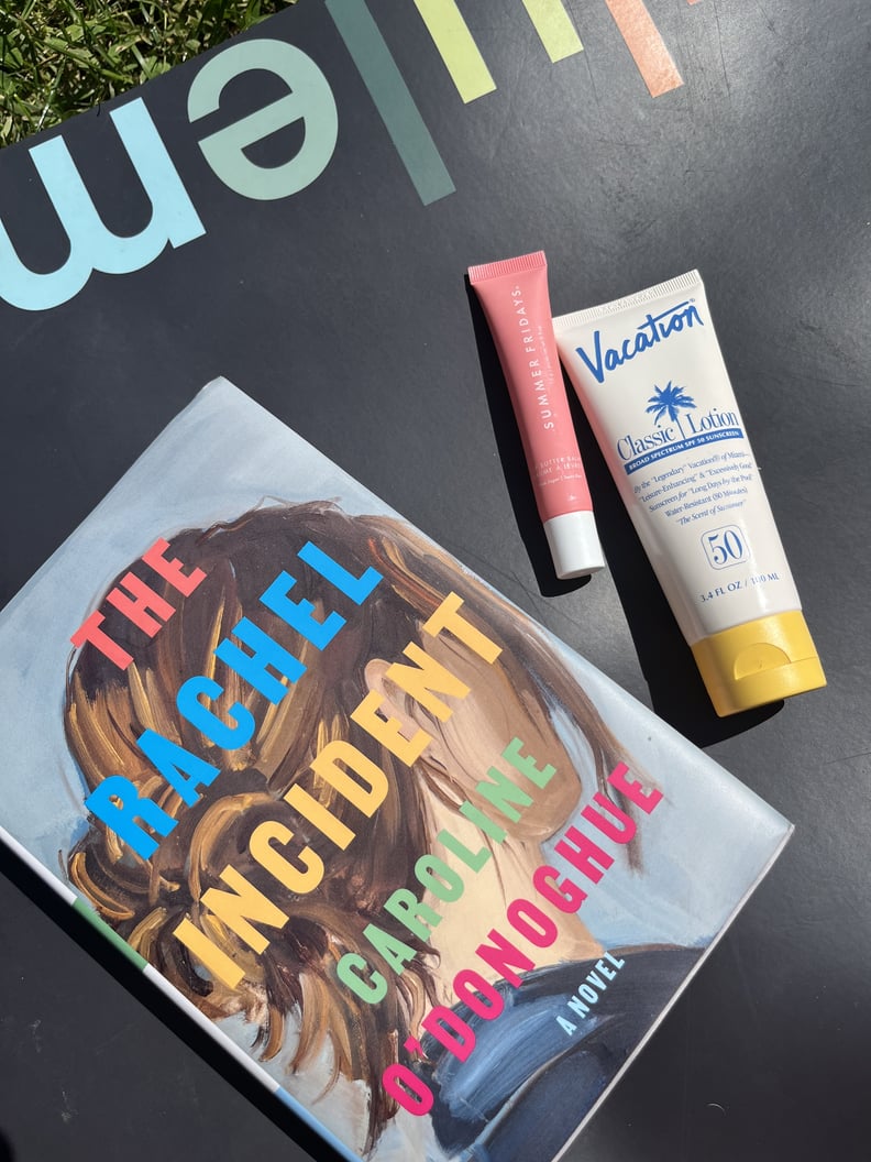 The Rachel Incident Book on a Lululemon Yoga Mat and Summer Fridays Lip Balm and Sunscreen