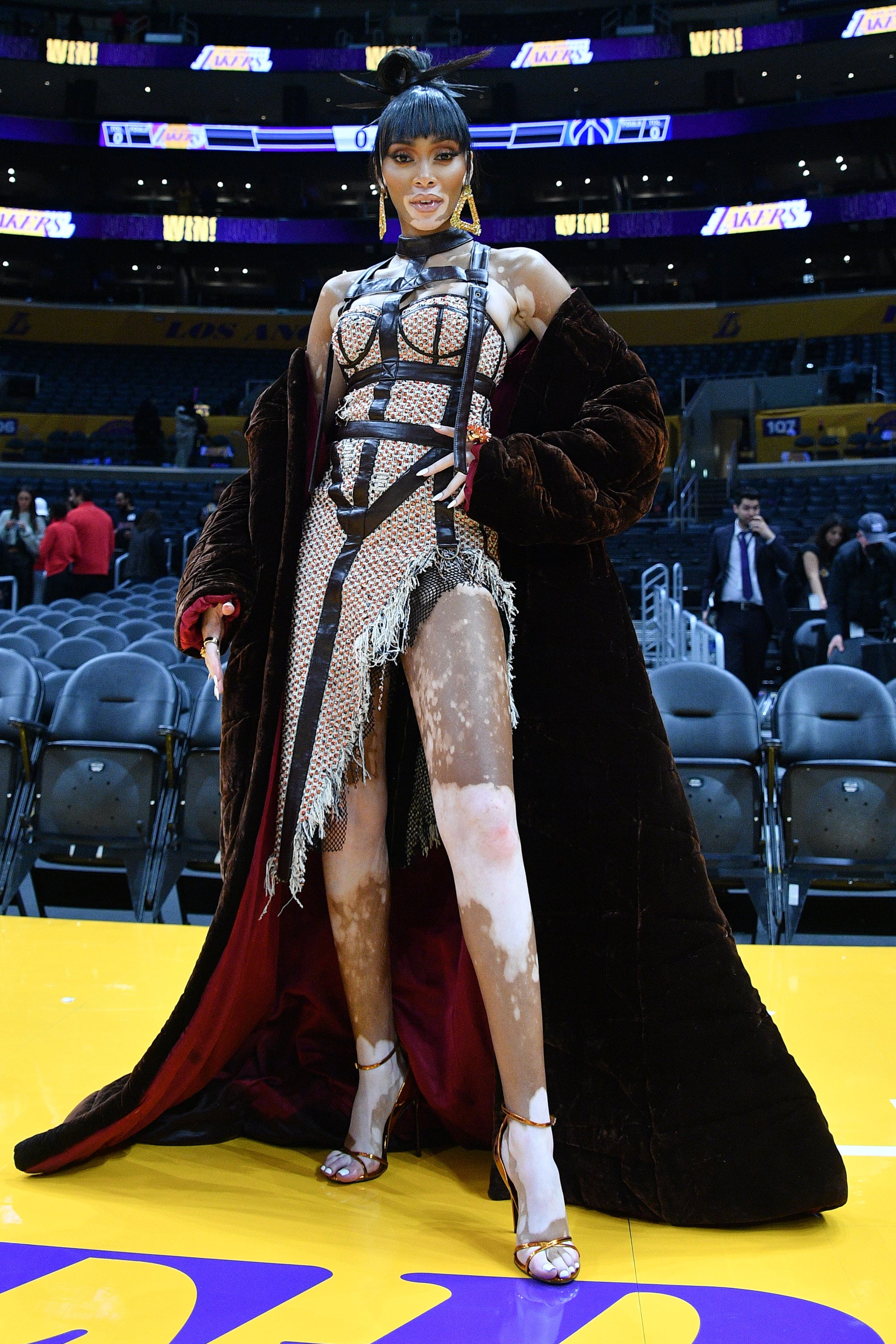 Winnie Harlow Soars in 6-Inch Sandals & Corset Dress at Lakers