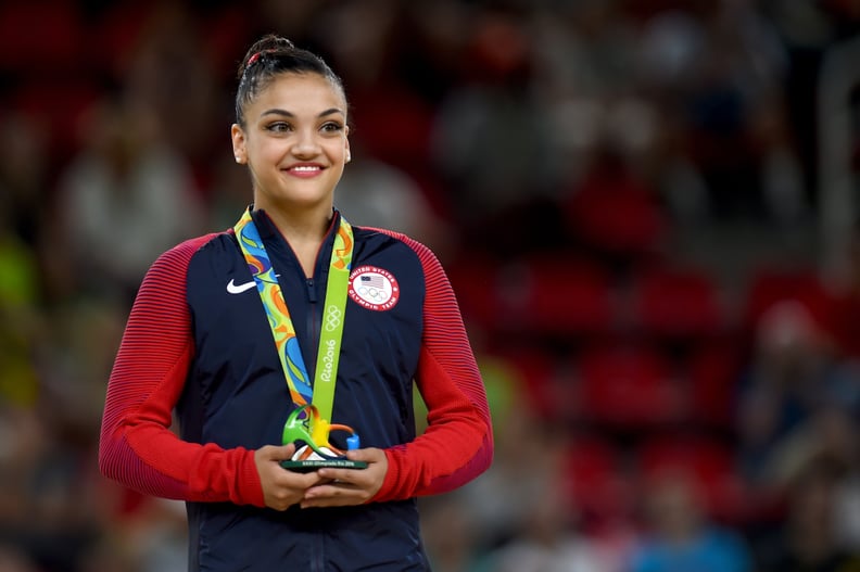 RIO DE JANEIRO, BRAZIL - AUGUST 15:  Silver medalist Lauren Hernandez of the United States celeberates on the podium at the medal ceremony for the Balance Beam on day 10 of the Rio 2016 Olympic Games at Rio Olympic Arena on August 15, 2016 in Rio de Janei
