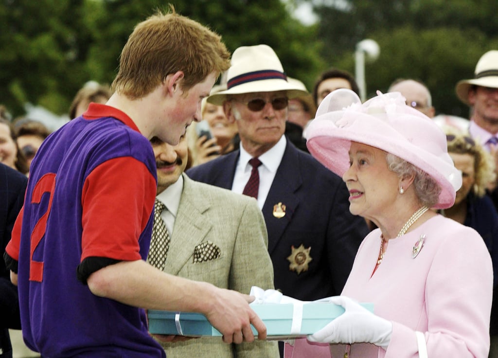 Queen Elizabeth II makes a presentation to Prince Harry, 2003