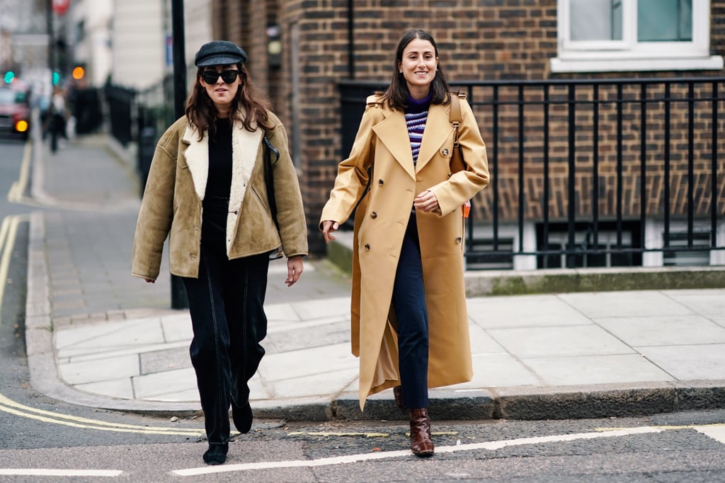 A timeless trench coat over navy and white stripes is forever classic.