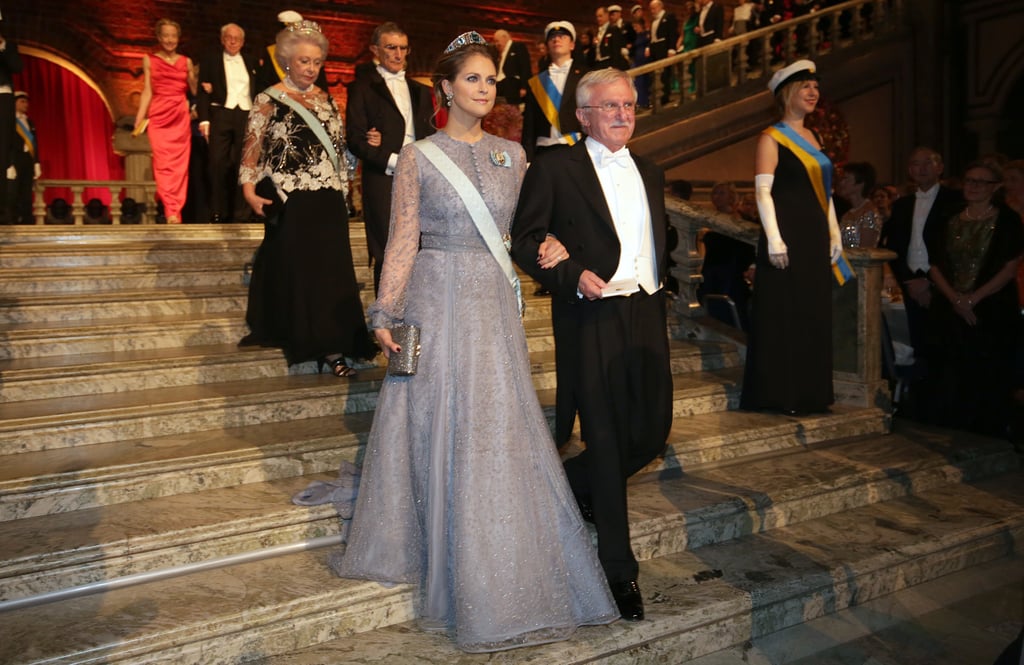 A Gray Princess Gown With Dainty Buttons