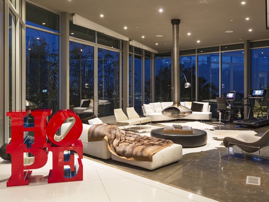 The cool marble-like floors give the living room a modern feel.