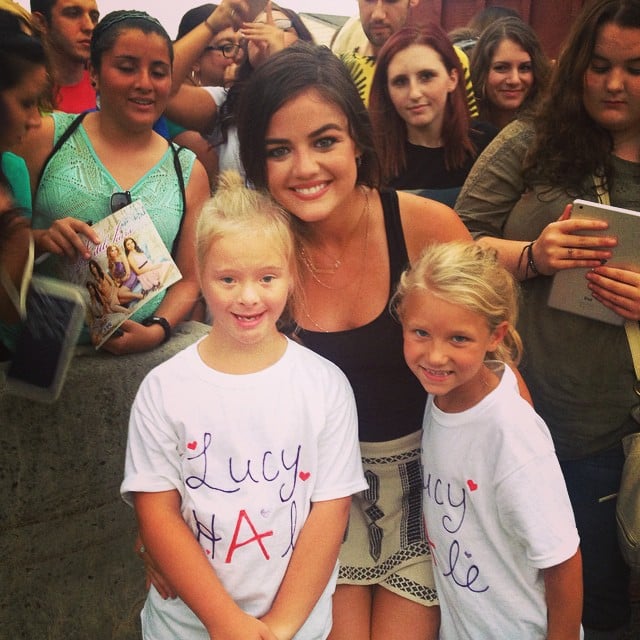 Lucy Hale took a picture with two young fans. 
Source: Instagram user lucyhale