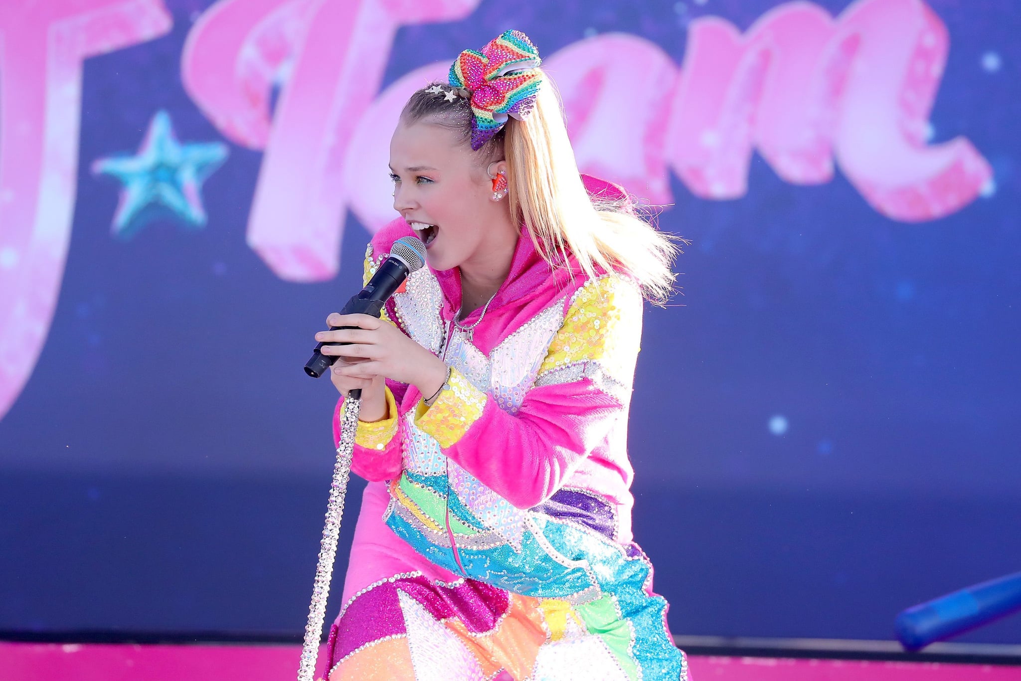 PASADENA, CALIFORNIA - SEPTEMBER 03: JoJo Siwa performs onstage during a drive-in screening and performance for the Paramount+ original movie