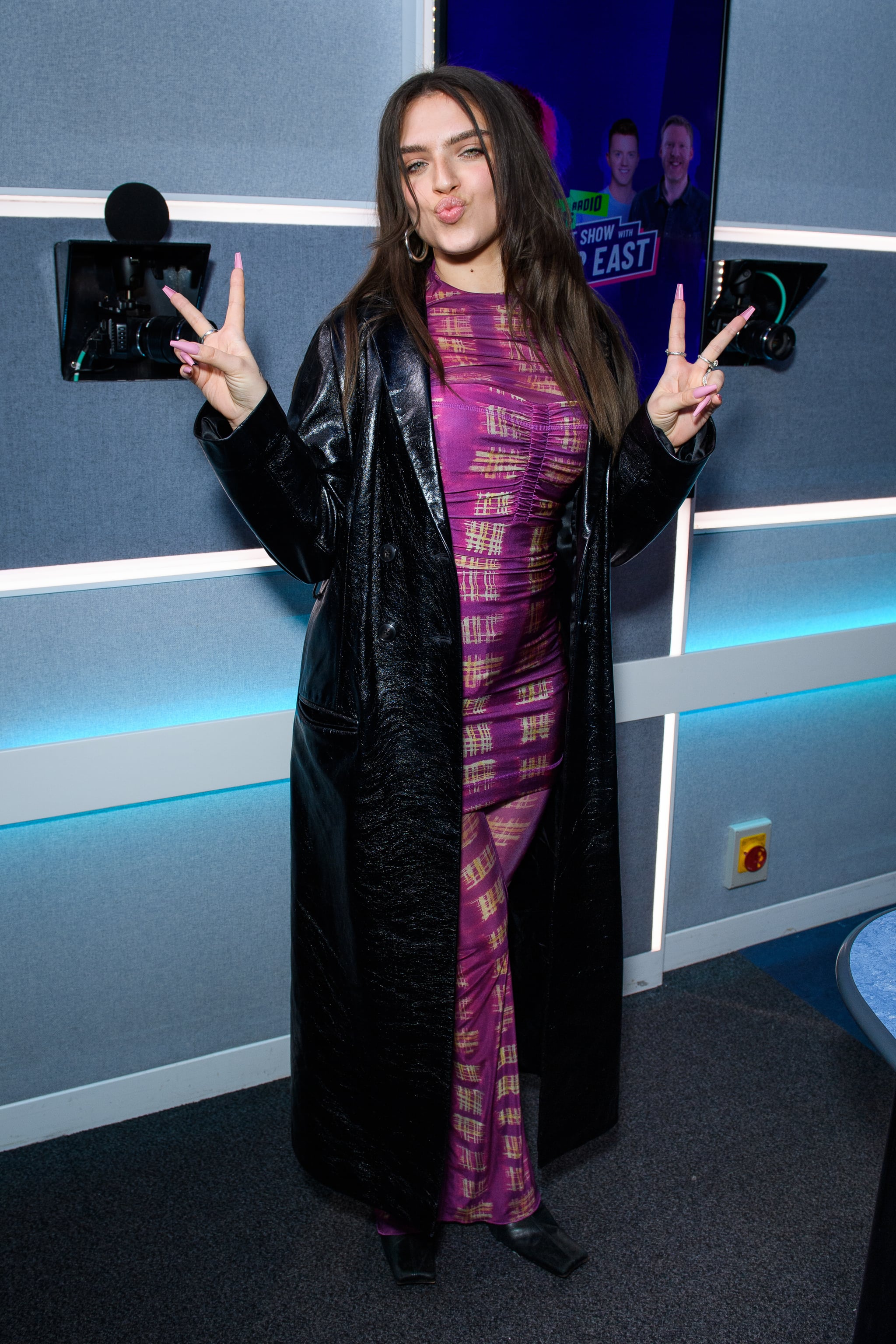 LONDON, ENGLAND - MARCH 09: Mae Muller poses as she visits HITS FM within Bauer Media at 1 Golden Square on March 09, 2023 in London, England. (Photo by Joe Maher/Getty Images For Bauer Media )