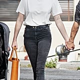 Style Your T-Shirt With: Jeans, Boots, And a Tote