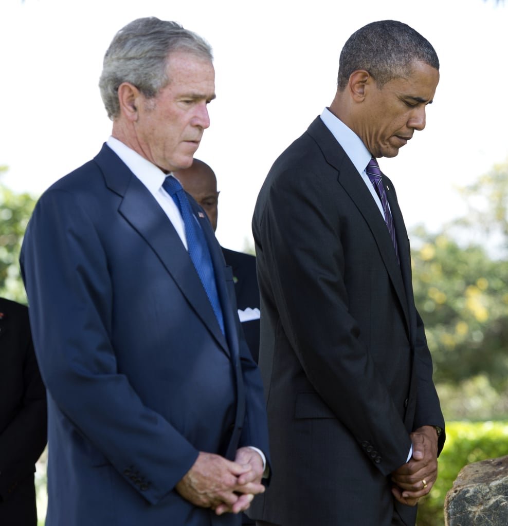 At the July 2013 wreath-laying ceremony for victims of the 1998 US Embassy bombing in Tanzania, President Obama and former President Bush bowed their heads in respect.