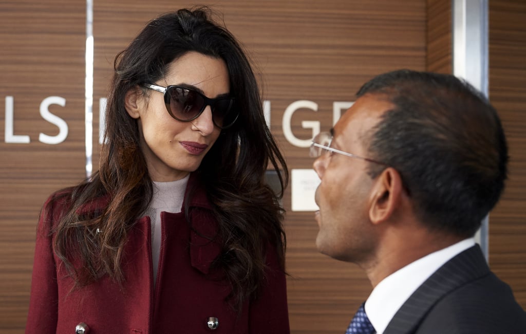 Amal Clooney Wearing a Red Coat
