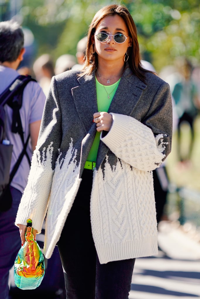 Coordinate a bright t-shirt with a printed bag.