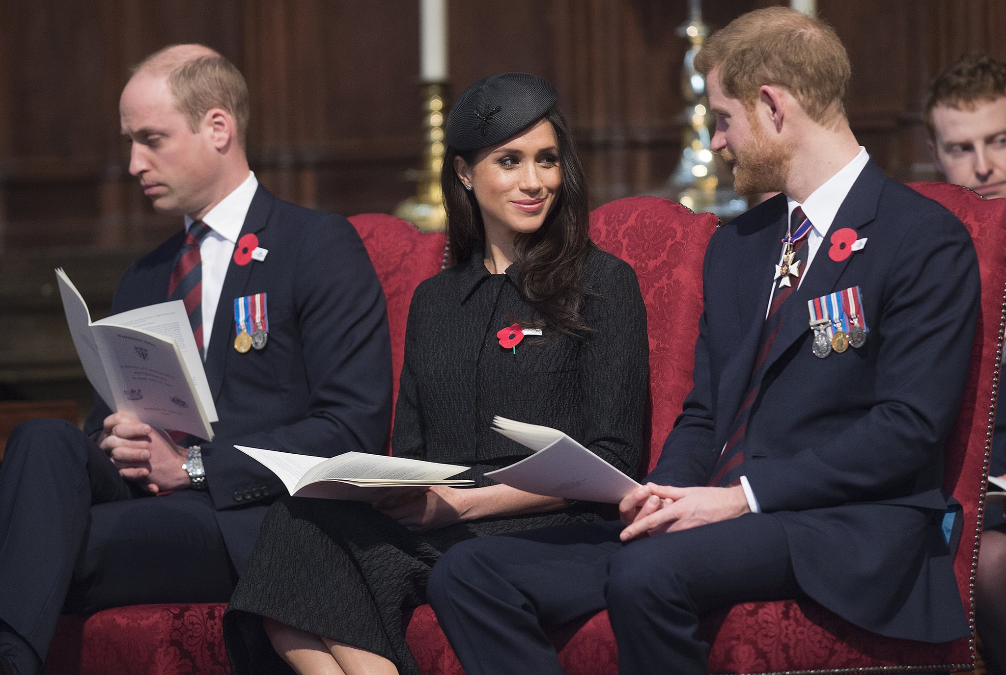 TOPSHOT - Britain's Prince Harry (R), his US fiancee Meghan Markle (C), and Britain's Prince William, Duke of Cambridge, attend a service of commemoration and thanksgiving to mark Anzac Day in Westminster Abbey in London on April 25, 2018. - Anzac Day marks the anniversary of the first major military action fought by Australian and New Zealand forces during the First World War. The Australian and New Zealand Army Corps (ANZAC) landed at Gallipoli in Turkey during World War I. (Photo by Eddie MULHOLLAND / POOL / AFP)        (Photo credit should read EDDIE MULHOLLAND/AFP/Getty Images)