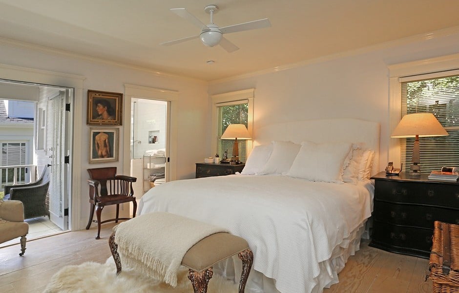 The all-white bedroom looks positively zen.