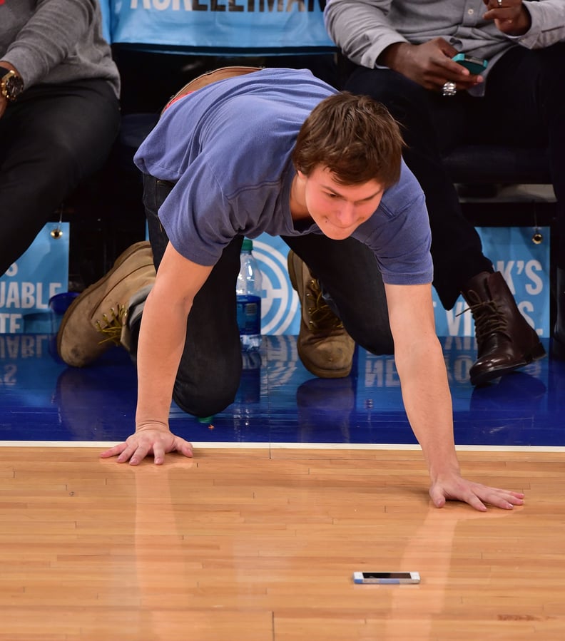 He dropped his phone on the court and CRAWLED after it.