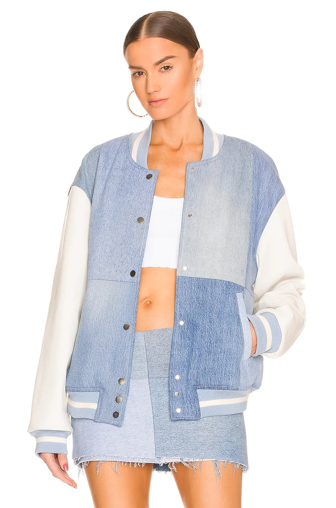 Channel multiple trends in one piece of outerwear with the EB Denim Varsity Jacket ($495), which features white leather sleeves and a faded patchwork finish.