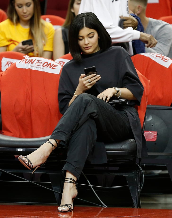 Kylie Jenner in Heels and Sweatpants at a Basketball Game