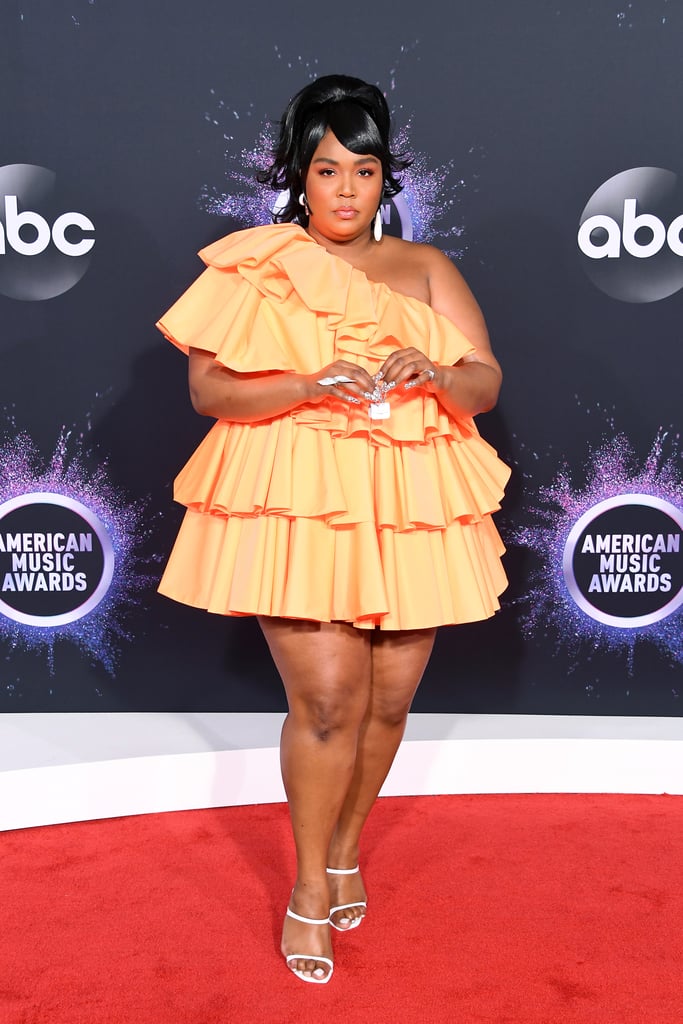 Lizzo's Miniature Valentino Bag and Orange Dress at the AMAs