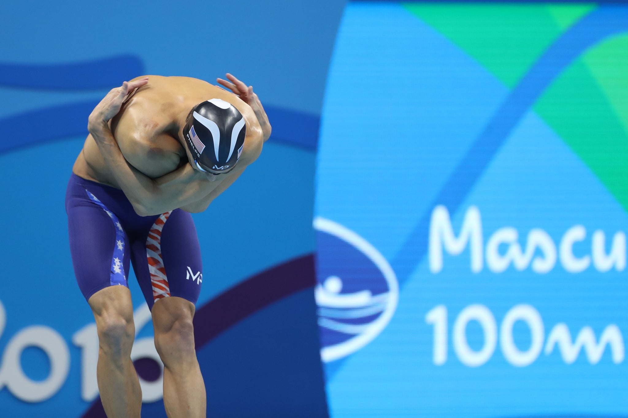 Swimming - Olympics: Day 7  Michael Phelps of the United States at the starting blocks before the Men's 100m Butterfly Final during the swimming competition at the Olympic Aquatics Stadium August 12, 2016 in Rio de Janeiro, Brazil. (Photo by Tim Clayton/Corbis via Getty Images)