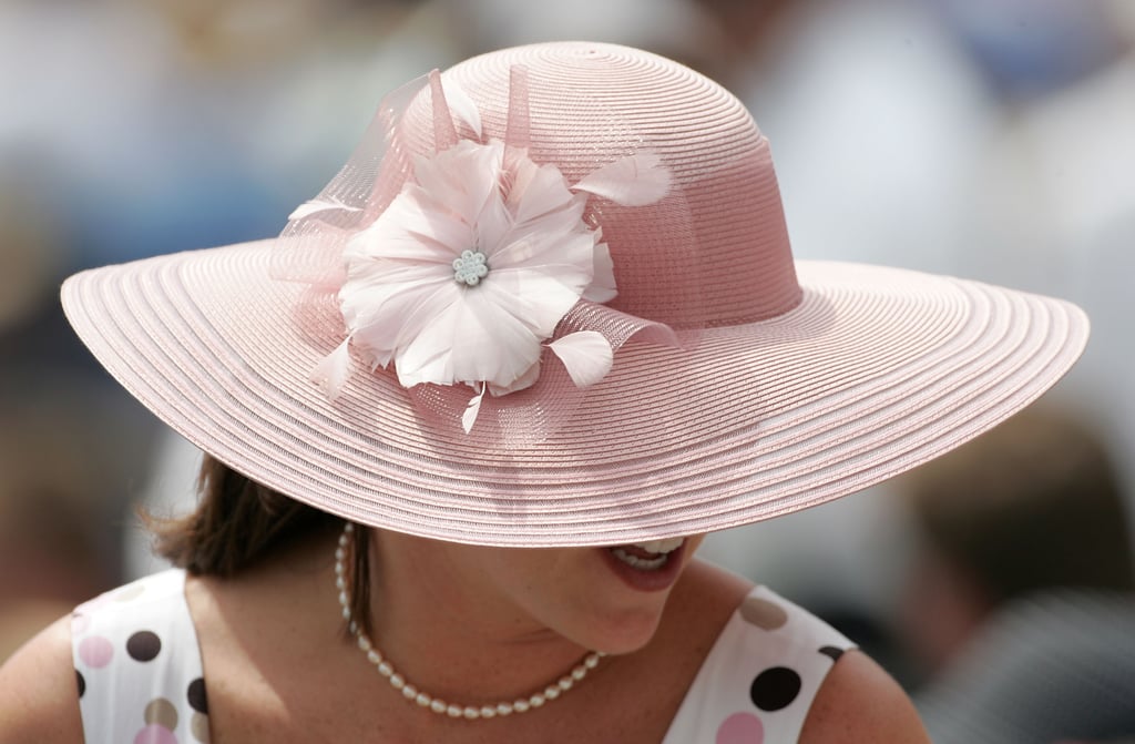A spectator was seen in the grandstand wearing her light-pink hat in 2007.